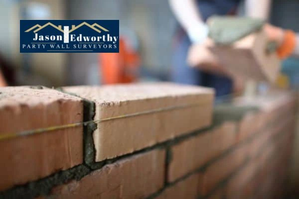 Call a surveyor today about Party wall insurance